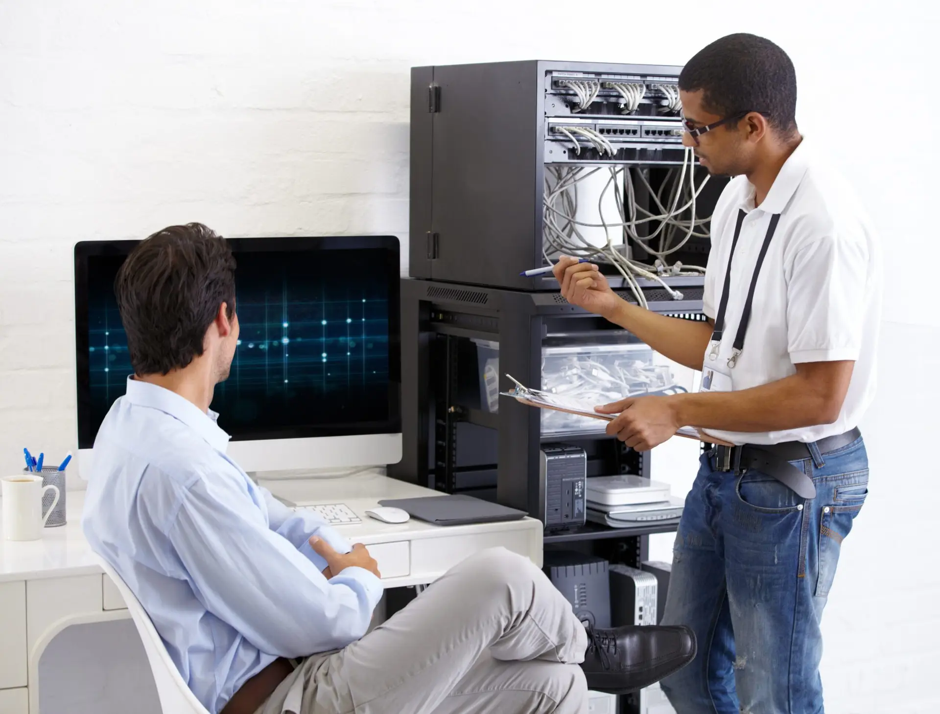 TotalBC IT support technician fixing network and server issues for a business